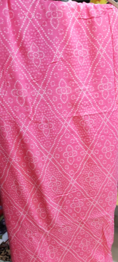 Pink fabric with white geometric pattern